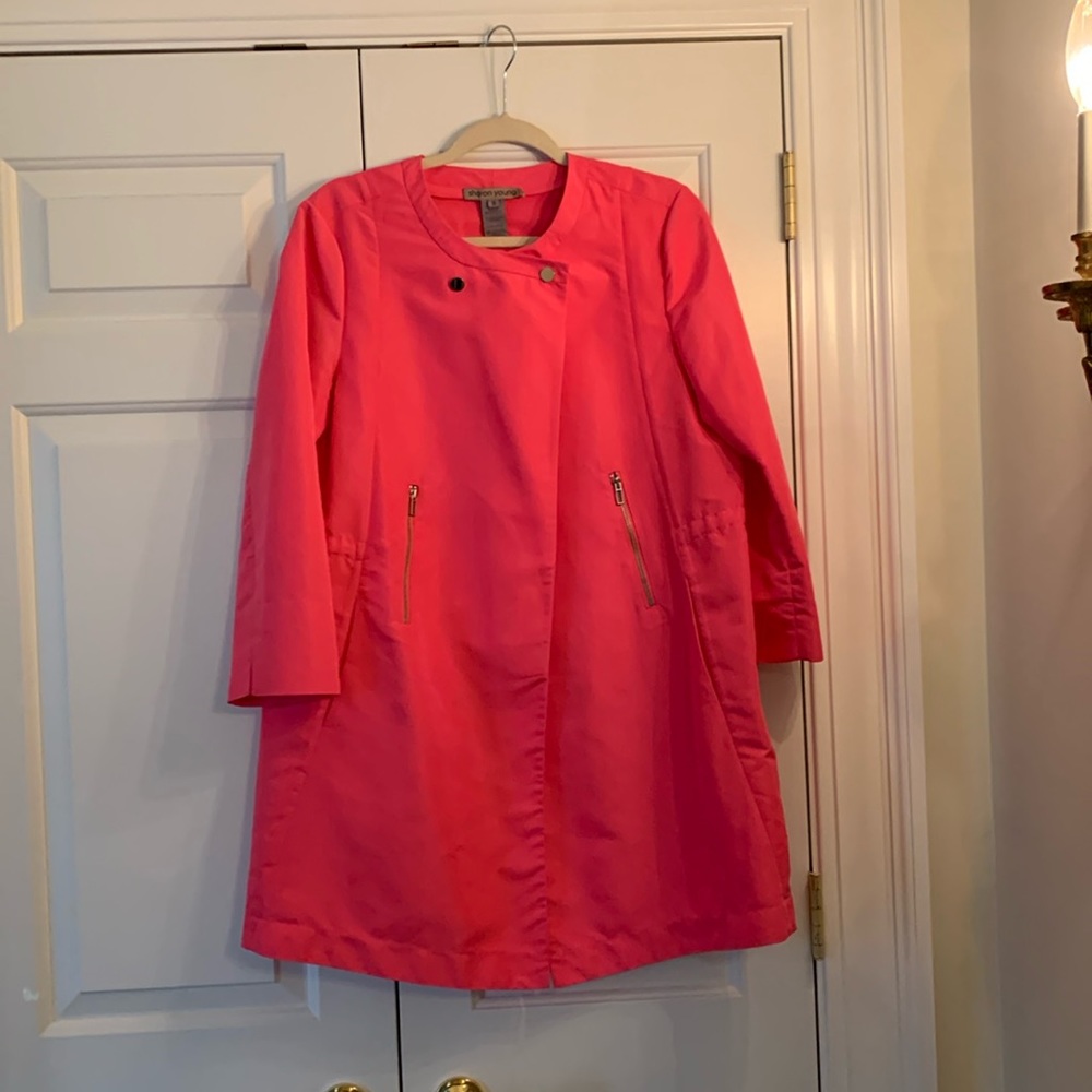 Sharon Young hot pink rain coat